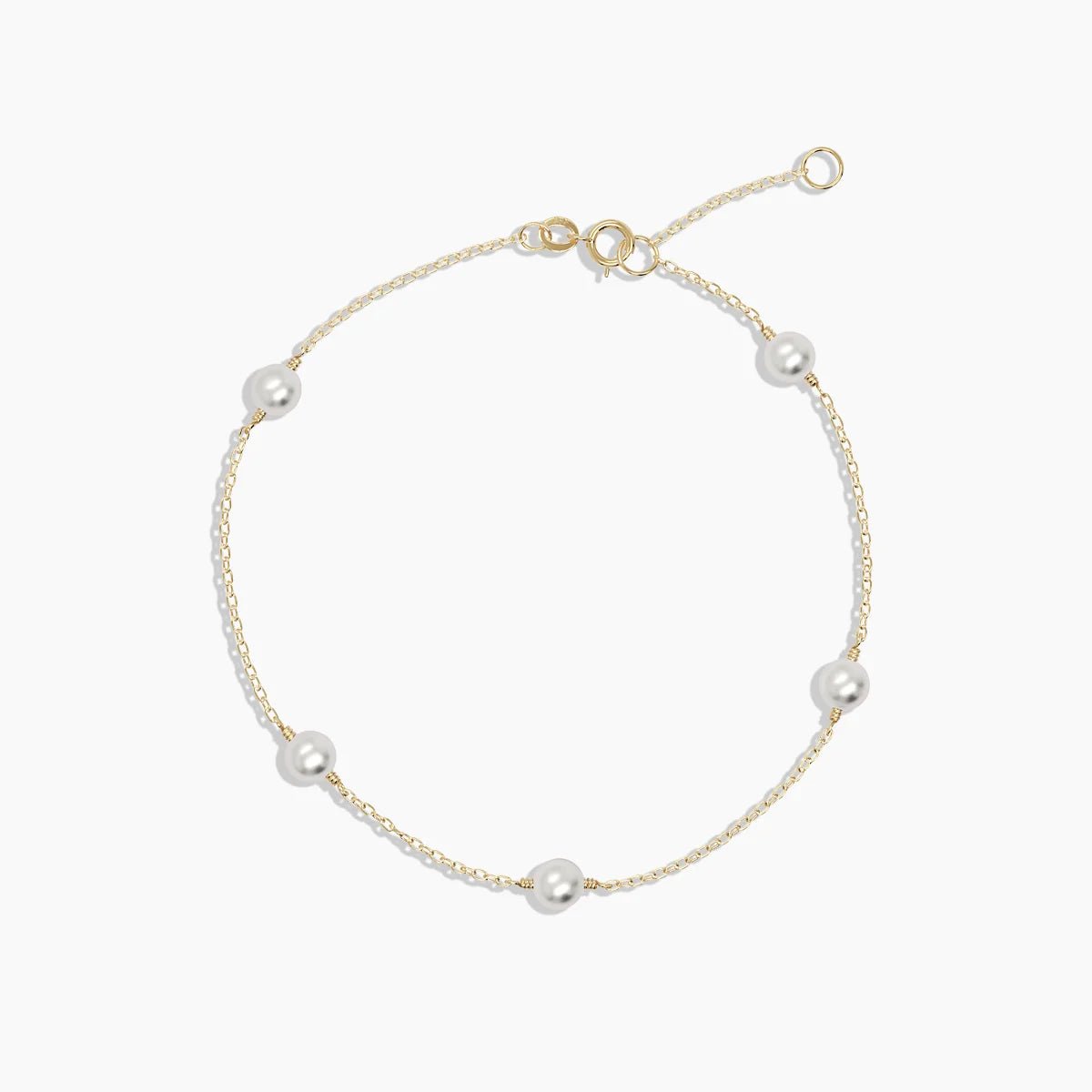 Multi pearl bracelet handcrafted in 14k yellow gold with six freshwater pearls on a fine chain.